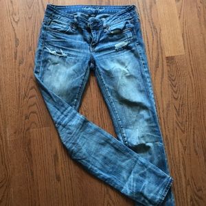 AE stretchy distressed blue skinny jeans